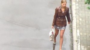 Sexy girl flashing her stocking tops. (3 of 3)