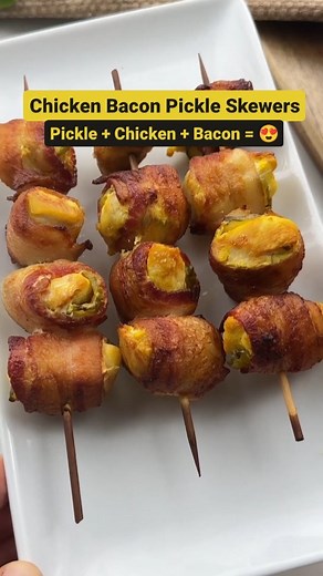 Chicken Bacon Pickle Skewers 🍗🥓🥒 Dive into this delicious 3-ingredient keto delight that's bound to be a crowd-pleaser! 🤤 What you need: 🍗 1 chicken breast, boneless skinless 🥓 8 slices of bacon 🥒 1/2 cup pickle juice 30 pickles 🧂 Seasonings of your choice Steps: 1️⃣ Bite-size the chicken & marinate in pickle juice pickles (2-24 hours). 2️⃣ Prep the bacon & season your chicken. 3️⃣ Add a pickle on each side of the chicken, wrap with bacon. 4️⃣ Skewer them up and air fry at 400F for 10-15