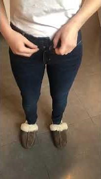 Buttoning and unbuttoning tight blue jeans #5