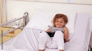 Doctor checking patient in bed with an oxygen mask