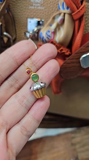 4.3K views · 16 reactions | No tricks, just pure treats.療 Perfect for the sweet tooth glitter lover- authentic 18K yellow gold cupcake necklace with natural lucky Jade, .15 carat ruby and diamond, 45cm chain, P25,850 only‼️ 1 piece available on hand (no restock). DM us to purchase  #MySweetGlitter #FunGlitter #CelebrateWithGlitter | Bagful of Glitter | Facebook