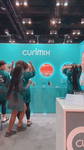 Thanks team for a beautiful booth. We’re “in the shower” doing our wash and go. Bath robes, bubbles, mirrors, lights and your @curlmix Shop CurlMix at Ulta 🧡. | CurlMix