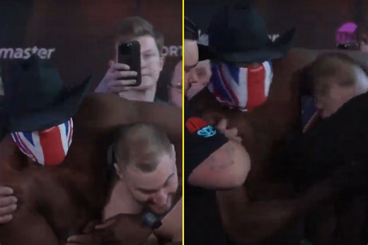 Derek Chisora puts Otto Wallin in a headlock during tense weigh-in as security pull boxers apart