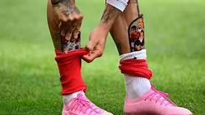 Why do professional footballers wear mini shin pads? Reasons for small leg guards in soccer explained | Goal.com US