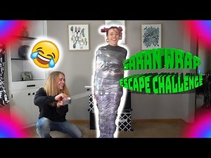 SARAN WRAP ESCAPE THE TAPE CHALLENGE (BRO vs SIS)