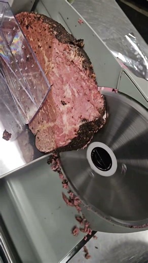 using a deli slicer to cut homemade pastrami