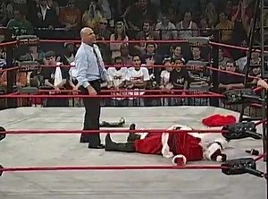 Throwback to that time Kurt Angle attacked Santa and made a girl in the crowd cry. | TNA Wrestling