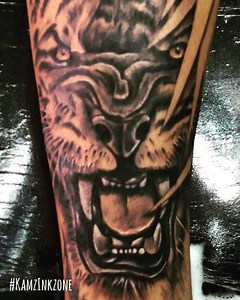 3.7K views | Tiger & lion. Tattoo on leg. Full concept by me. song- @sippygillofficial TATTOO - Kamz Inkzone. #tigertattoo #liontattoo #legtattoo #oneye #kamzinkzone #inkzone #desi. #tattoos #tattooinpuniab | Kamz Inkzone | Facebook
