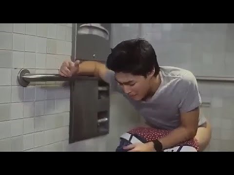 Man taking a shit on a dirty toilet
