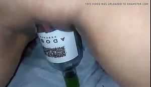 Girl sitting on bottle