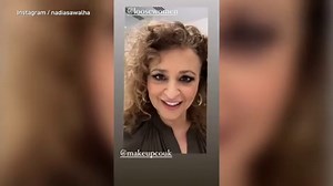 Nadia Sawalha dances after getting her makeup done for the telly