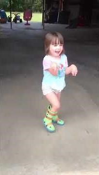 Autistic girl hand flapping