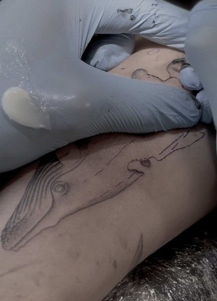 Whale tattoo by Simon in Black