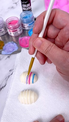 Also paint chocolate with our Edible Paint Powders The Color Solution 🎨✨🌷🐰 Check out the latest YouTube on this! Super simple Easter Cupcakes anyone can do! Shop Egg & Flower molds on our site, too. | TheSugarArt.com