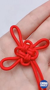 20K views · 946 reactions | #ChinaStory Chinese knot is a kind of hand-woven handicraft which shows the exquisiteness and wisdom of ancient Chinese people. It is a symbol of unity, happiness, and safety. | China Daily | Facebook