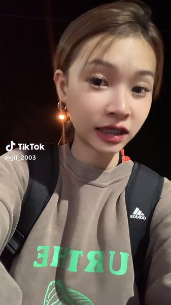 Brown Hoodie Style: Urban Night Fashion Inspiration