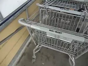 Camera man pees on shopping carts