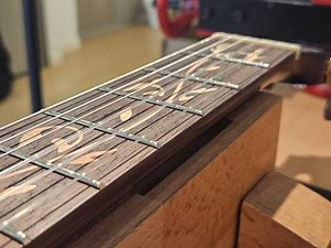 Classical guitar fret replacement and fret hand-cut repair