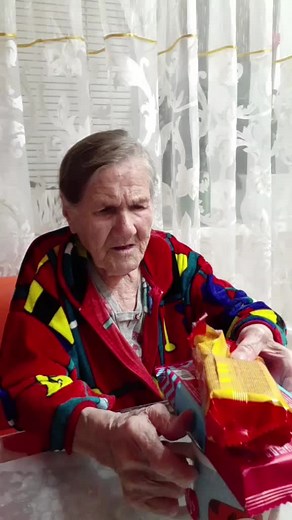 Grandma Enjoys Snacks in Charming Video