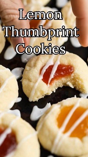 Lemon Thumbprint Cookies There's nothing quite like the fresh, zesty flavor of Lemon Thumbprint Cookies to brighten your day! These delightful treats are perfect for any occasion, and they bring a burst of sunshine to your dessert table. With just a handful of simple ingredients—like creamy butter, vibrant lemon zest, and sweet preserves—these cookies are incredibly easy to make and sure to impress everyone who bites into their tender, buttery goodness. Plus, the drizzle of glaze on top adds a c