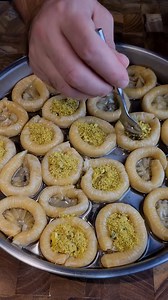 ⭐💖⭐ Tanios Issa's Middle Eastern Asawer (Bracelets)⭐💖⭐ Crunchy round filo, drenched in syrup and topped with chopped pistachios. Kitchenware: • Knife and cutting board • Round objects (metal straw, skewers or anything Round) • Baking pan • Brush Ingrideints: • Pack of filo dough (1lb) • 1 Cup of chopped pistachios • ½ cup of ghee butter • ½ cup of syrup (2 parts sugar 1 part water) Methods: • Cut filo dough into 6x8 inch • Stack 2 layers for each piece (bracelet) • Using a metal straw, place o