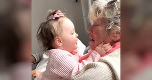 Baby girl melts hearts carrying on adorable 'chat' with grandma