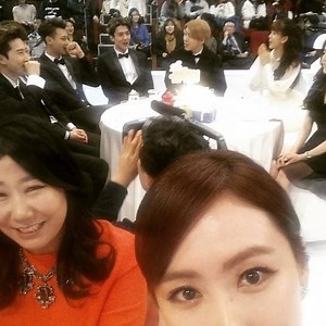 Hong Eun Hee takes a candid photo of EXO at the '2014 MBC Entertainment Awards'