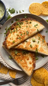 day 28 of 30 summer dinners: crispy refried bean tacos 🙌 Comment “refried beans” & I’ll DM you the recipe! my guilty (although to be fair, not so guilty!) pleasure meal - ridiculously easy and so tasty. Recipes for the tacos and the avocado sauce are both on my website! #tacos #refriedbeans #beantacos #vegetarianrecipe #easymeals | By The Forkful