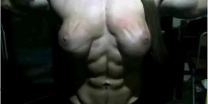 sexual muscles exploding out of her clothes