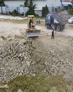 4.7K views · 19 reactions | Clearing the Way: KOMATSU D37E Deletes Forest and Develops Land with 5-Ton Dump Trucks #Dozer #Bulldozer #heavyequipment #construction #Shantui #Komatsu #Dumptruck #Excavator #constructionsite #heavyduty #earthmoving #caterpillar | JCB Backhoe Loader | Facebook