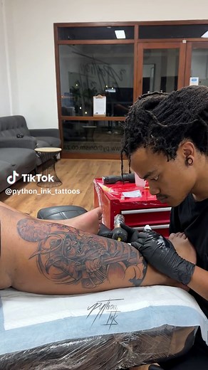 Detailed Leg Tattoo Process with Professional Artist