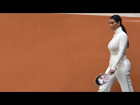 Kim Kardashian Carries Cutout of Brother Through Armenia, Has North West Baptized in Jerusalem Ch…