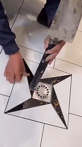 Tile Setting To Create An Ornate Shower Drain Design | Decoist