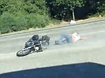Heart-stopping moment motorcyclist loses control in death wobble