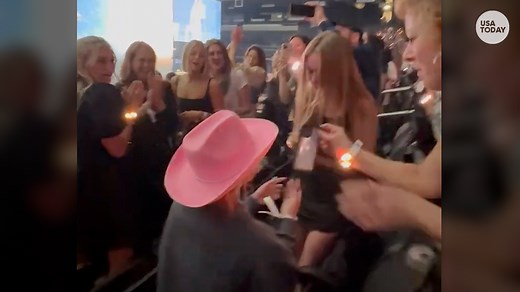 "Love Story," indeed! Couple gets engaged at a Taylor Swift concert in Las Vegas. | USA TODAY Video