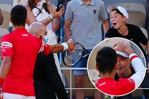 Novak Djokovic hands jubilant kid his racket and claims young fan COACHED him to French Open win