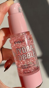Have you seen a cuter primer?! 😍 Make your makeup last all day with our new skincare-powered Y2k Hydra Bubble Primer 🫧 Supercharged with Hyaluronic Acid, Vegan Collagen, Vitamin E & Niacinamide, this serum-primer hybrid works hard to help maintain healthy skin while giving a glowy base with pearlescent micro shimmer balls! ✨ #MakeupRevolution #Y2k #2000Makeup #Y2kAesthetic #MakeupPrimer #ThatsTotallyY2k #RevProduct | Makeup Revolution