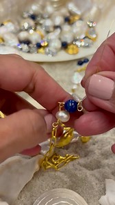 Hand-assembled with freshwater pearls, shimmery semi-precious stones and coral castings, the Capri Necklace is our ode to the sea.  | Sequin | Facebook