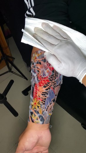 Tattoo Art Inspired by Colorful Koi Fish in Chitwan