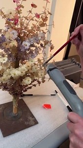 When our Mexican flower bouquets get dusty, our team springs into action… very carefully. 🖌️ #MuseumMonday | Museum of International Folk Art