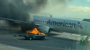 Watch: American Airlines Plane Catches Fire at Denver Airport