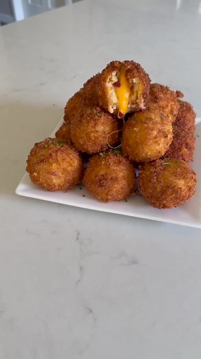 14K views · 239 reactions | Mashed potatoes are the perfect holiday side dish, but they're even better when you add bacon and shredded Cheddar and deep fry them! Plus, when you use Prairie Farms Dairy milk and sour cream to make them like I did they'll end up perfectly fluffy and leave you and your guests wanting more! | DudeFoods.com | Facebook