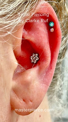 🌟 Clarke Ruf, our head Piercer, just nailed this stunning triple piercing. Conch and double helix piercing combo with sleek titanium jewelry. 😍✨ Precision and style at its finest! Come experience the magic of expert piercing at our studio today. Book your appointment now! #MasterPierce #PiercingPerfection #ExpertPiercer #wellington #TitaniumJewelry #southflorida #QualityPiercings #UniquePiercings #SafePiercings #BookNow #CreativeProjects #bestpiercingshop #titaniumjewelry #piercer #piercerlove