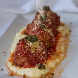 House Made Meatballs with soft parmigiano polenta, broccoli rabe pesto, crispy pancetta👨🏻‍🍳#yum #meatball #homemade #madefromscratch #Esca #DateNight #Saturday #MiddletownCT | Esca Restaurant & Wine Bar