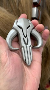 Available Now! https://buff.ly/2Wn01lf Originally seen on Boba Fett’s™ shoulder armor in Star Wars: The Empire Strikes Back™, the Mythosaur symbol was shrouded in mystery for decades. In that time, it was alternatively referred to as a Bantha skull symbol or a Mythosaur skull symbol. Season 3 of The Mandalorian introduced this new interpretation of the classic icon. | Regal Robot