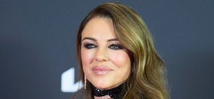 Elizabeth Hurley, 59, Flaunts Beach Body In Yellow Bikini Video