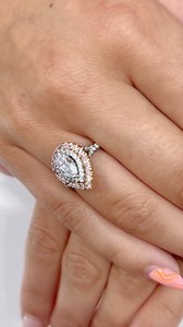 Absolute pear-fection! 💖 A symphony of grace and opulence unfolds in this show stopping diamond ring, featuring an impressive 0.70 carat pear shaped diamond, set within a platinum and rose gold double halo, shimmering with natural pink and white diamonds. Available in-store only. | Macintyres of Edinburgh