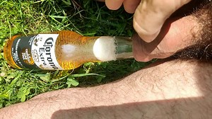 My foreskin play with bootle of beer