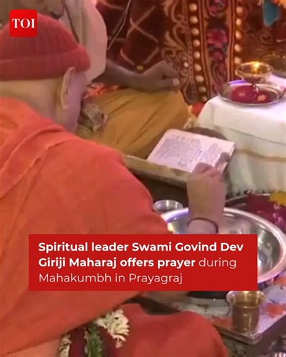 Watch | Spiritual leader Swami Govind Dev Giriji Maharaj offers prayer during #Mahakumbh2025, in Prayagraj Shrimad Bhagwad Katha and an 'Anushthan' will be organised today on his birth anniversary | The Times of India