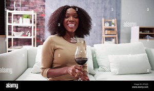 Romantic Home Dinner Video Conference With Wine Stock Photo - Alamy